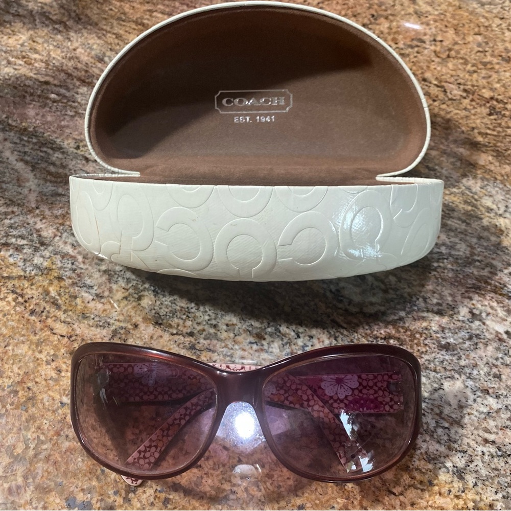 These are very nice Coach sunglasses with a hard Coach case.